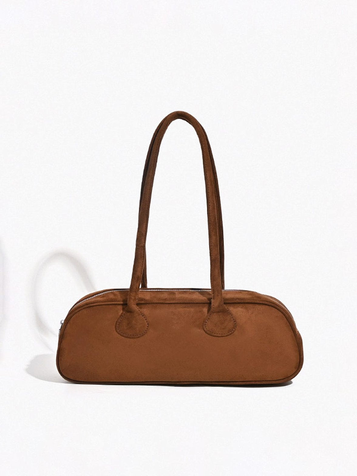 Sac baguette marron élégant vue avant soleil