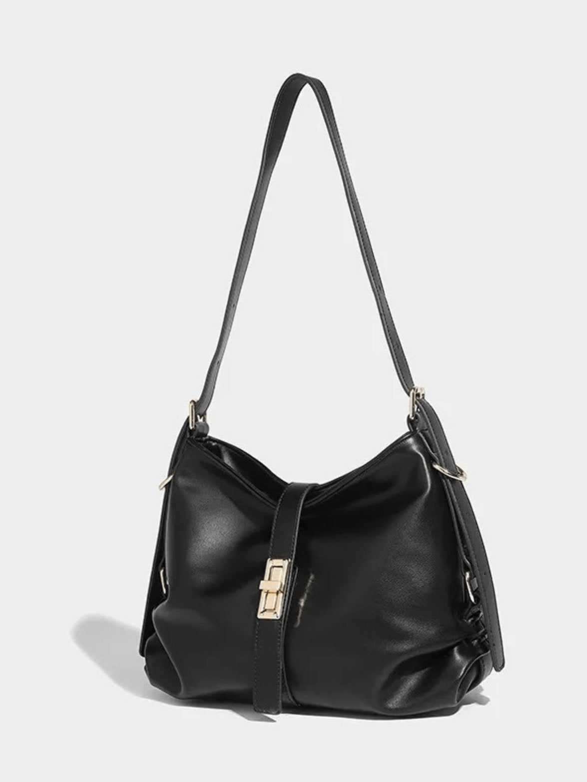 Sac cuir noir vue de côté soleil