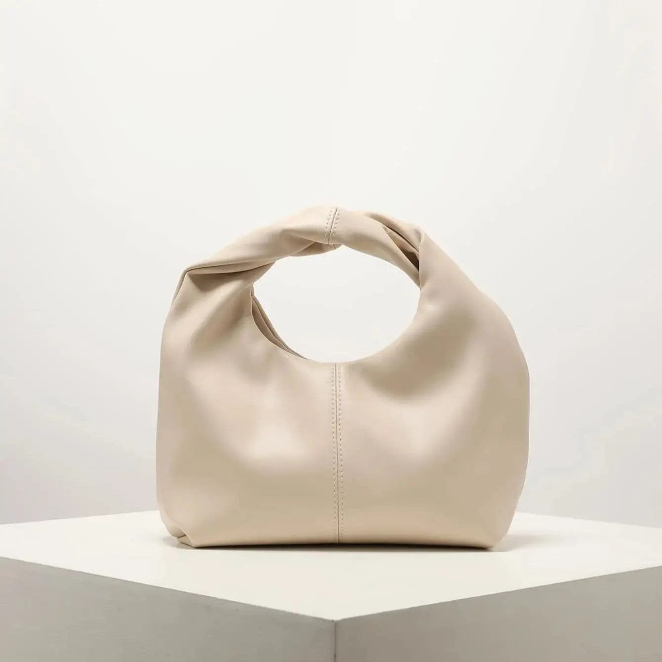 Sac à main élégant carré beige soleil