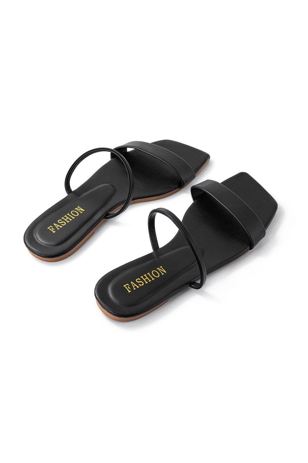 Sandales plates noires à bout carré vue dessus soleil