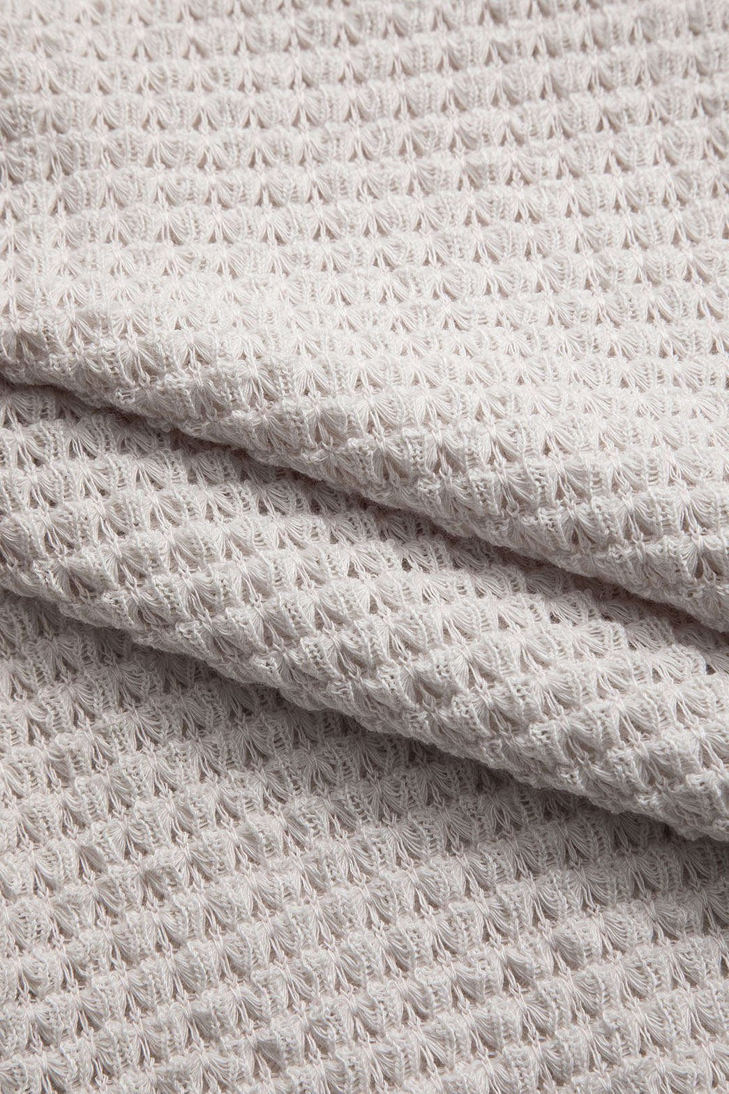 T-shirt plissé blanc vue latérale élégance