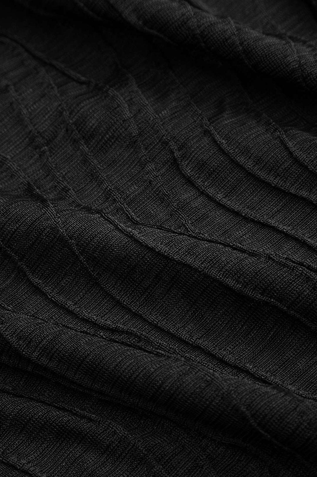 Top asymétrique noir drapé détail nœud nuage