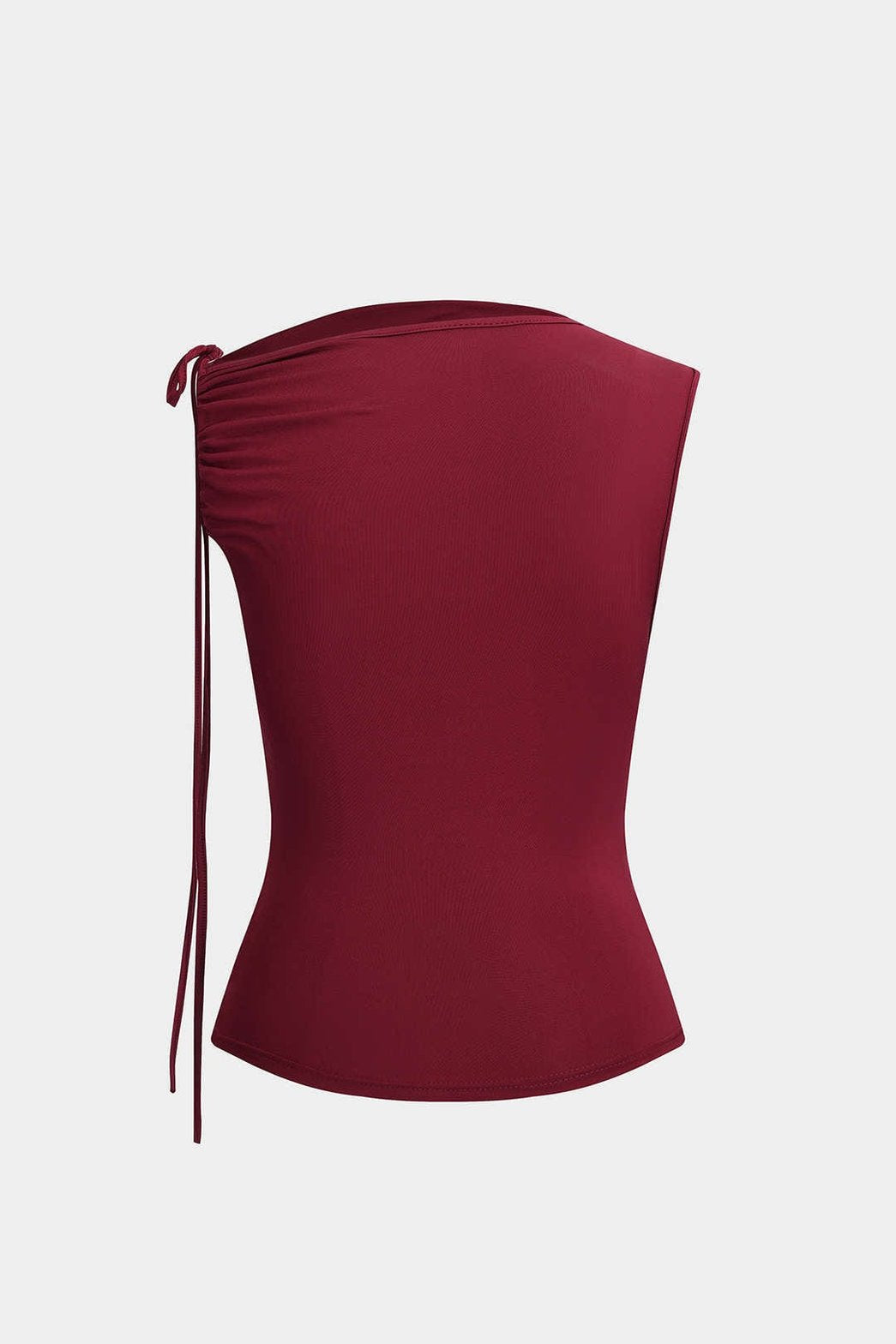 Top asymétrique bordeaux porté style décontracté vent