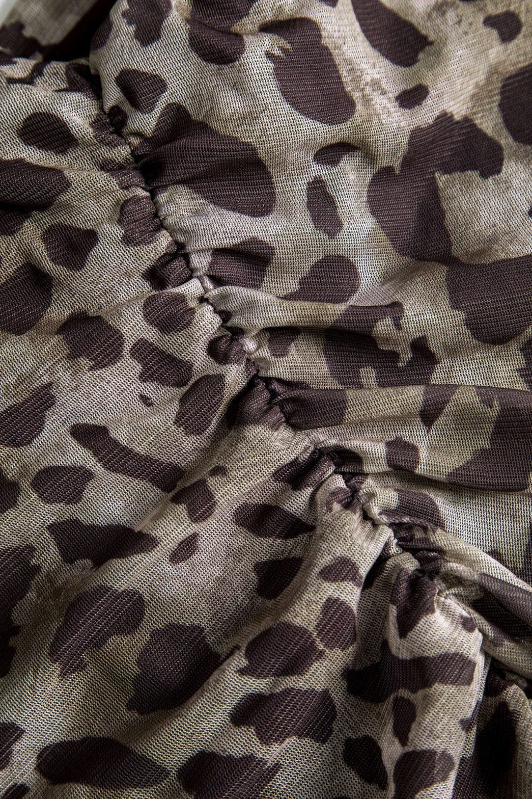 Top asymétrique léopard vue de dos étoile