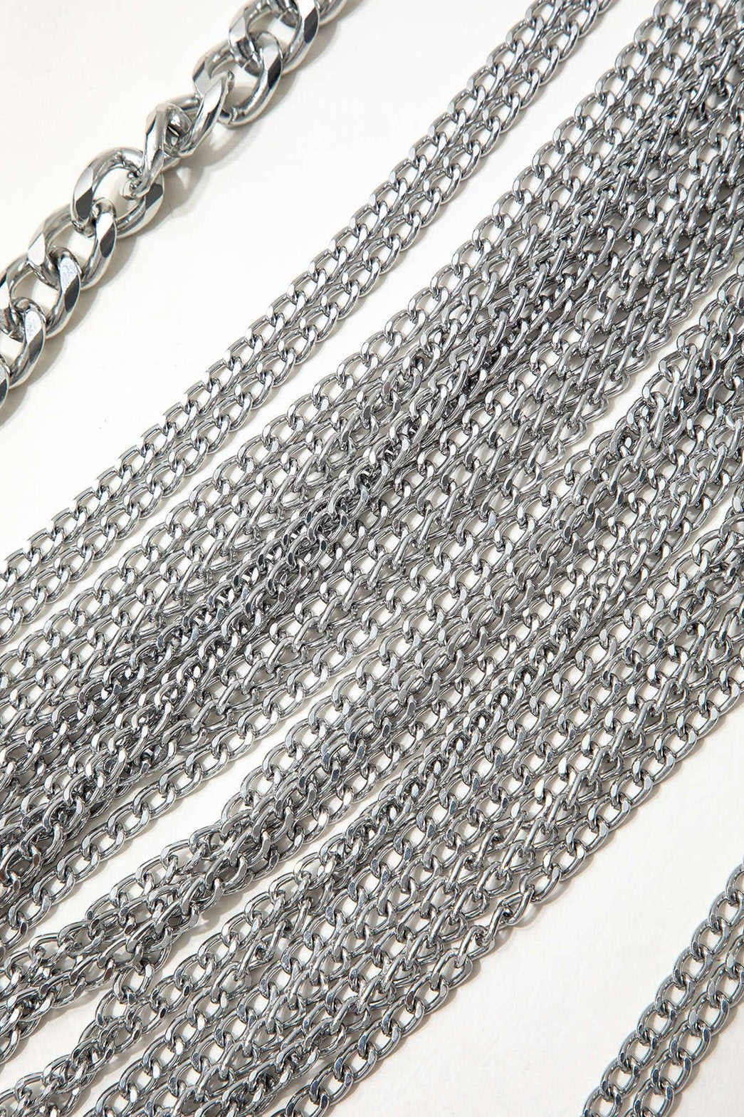 Top chaînes métalliques drapé soleil