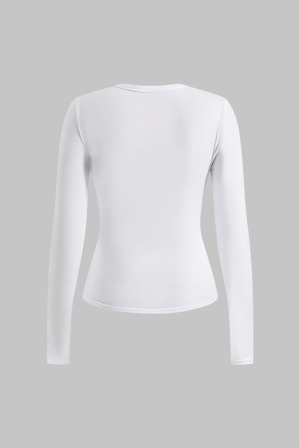 Top blanc drapé vue trois-quarts grâce