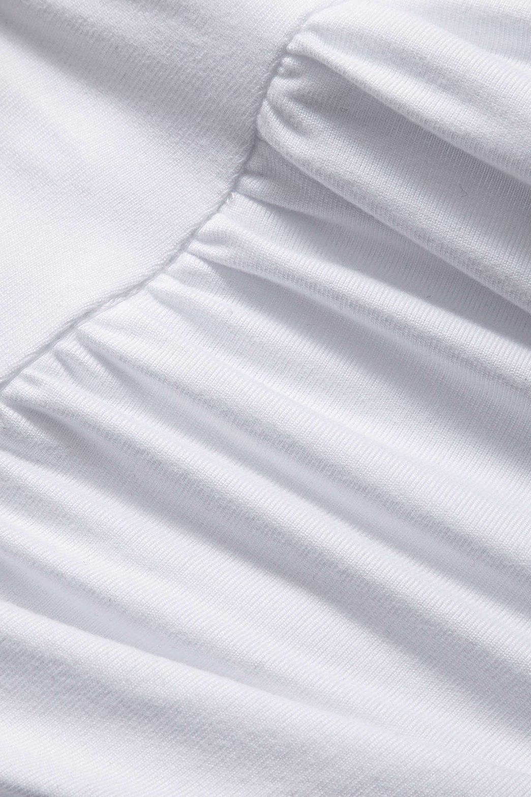 Top blanc manches longues vue rapprochée étoile