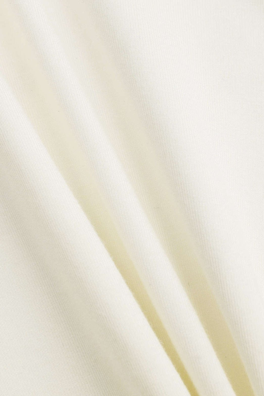 Top blanc drapé manches longues vue de côté étoile