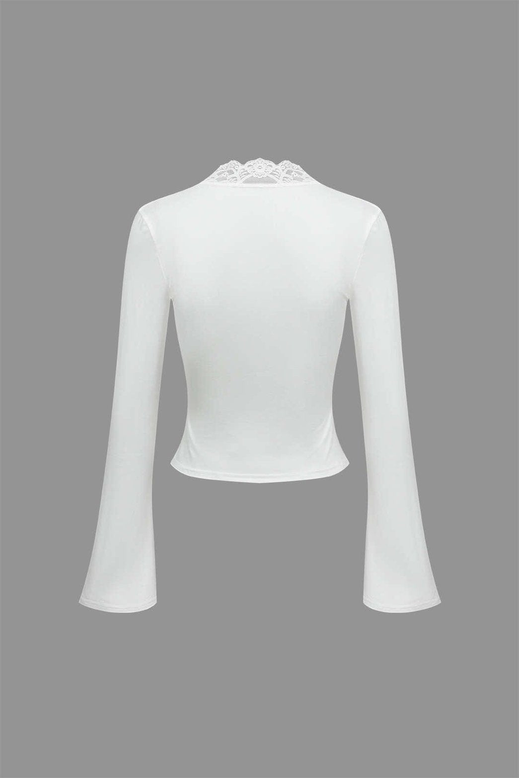 Top blanc manches évasées grâce