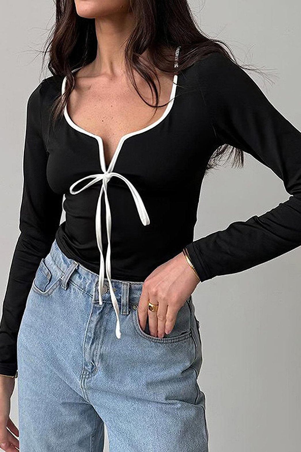 Top manches longues détail nœud blanc perle