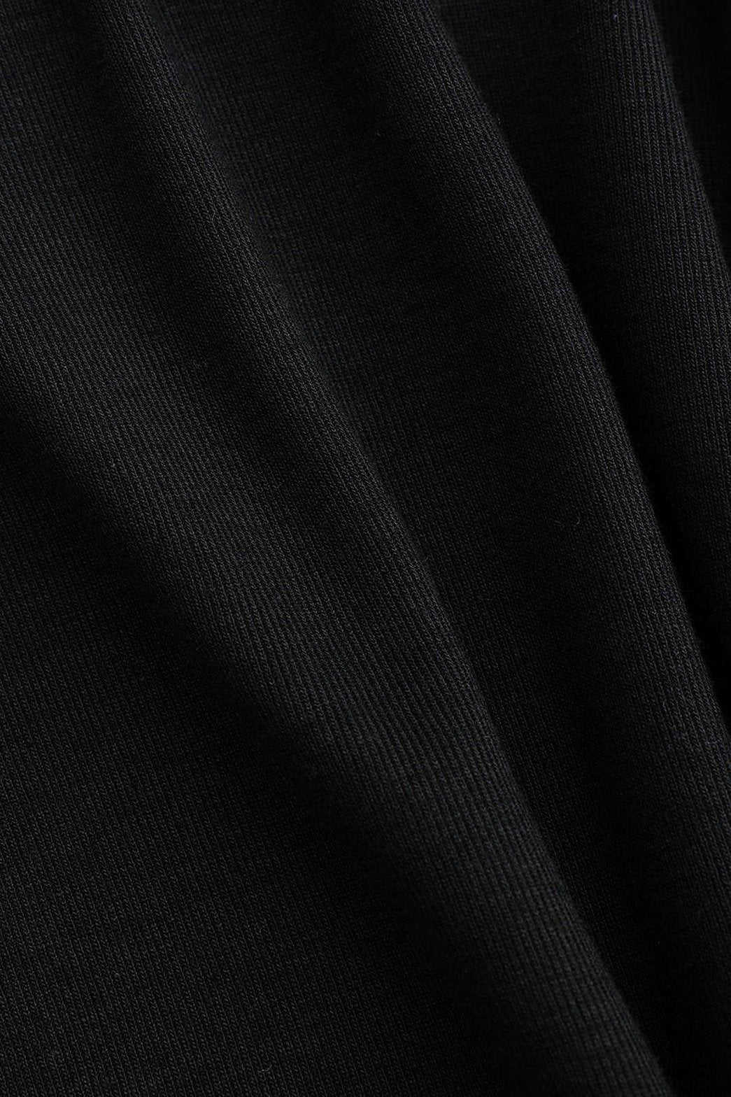 Top noir col rond avec nœud élégance