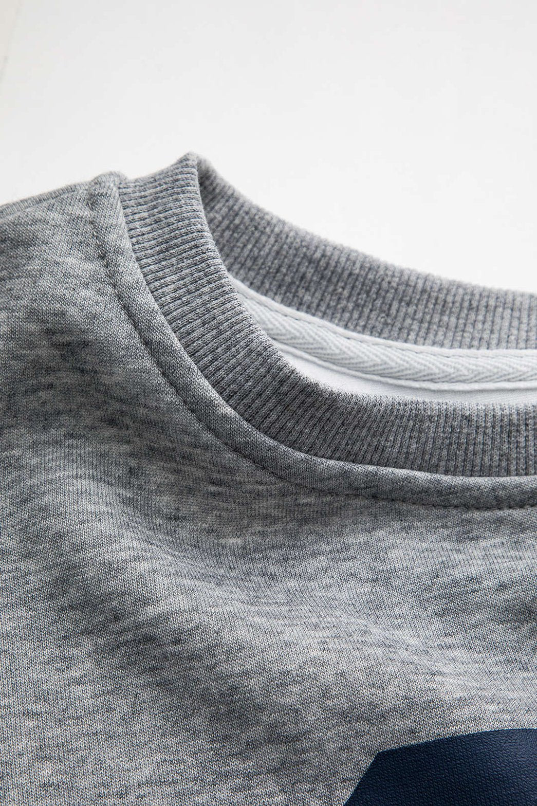 Top oversize gris à imprimé digital porté pluie