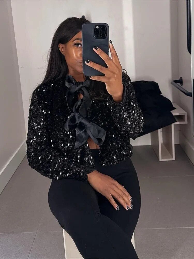 Top élégant pailleté nœuds contrastes éclat
