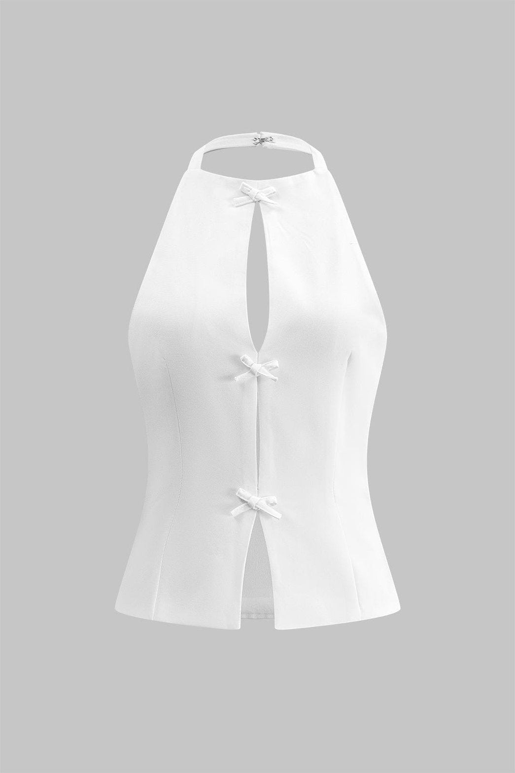 Top plissé blanc avec nœuds décoratifs douceur