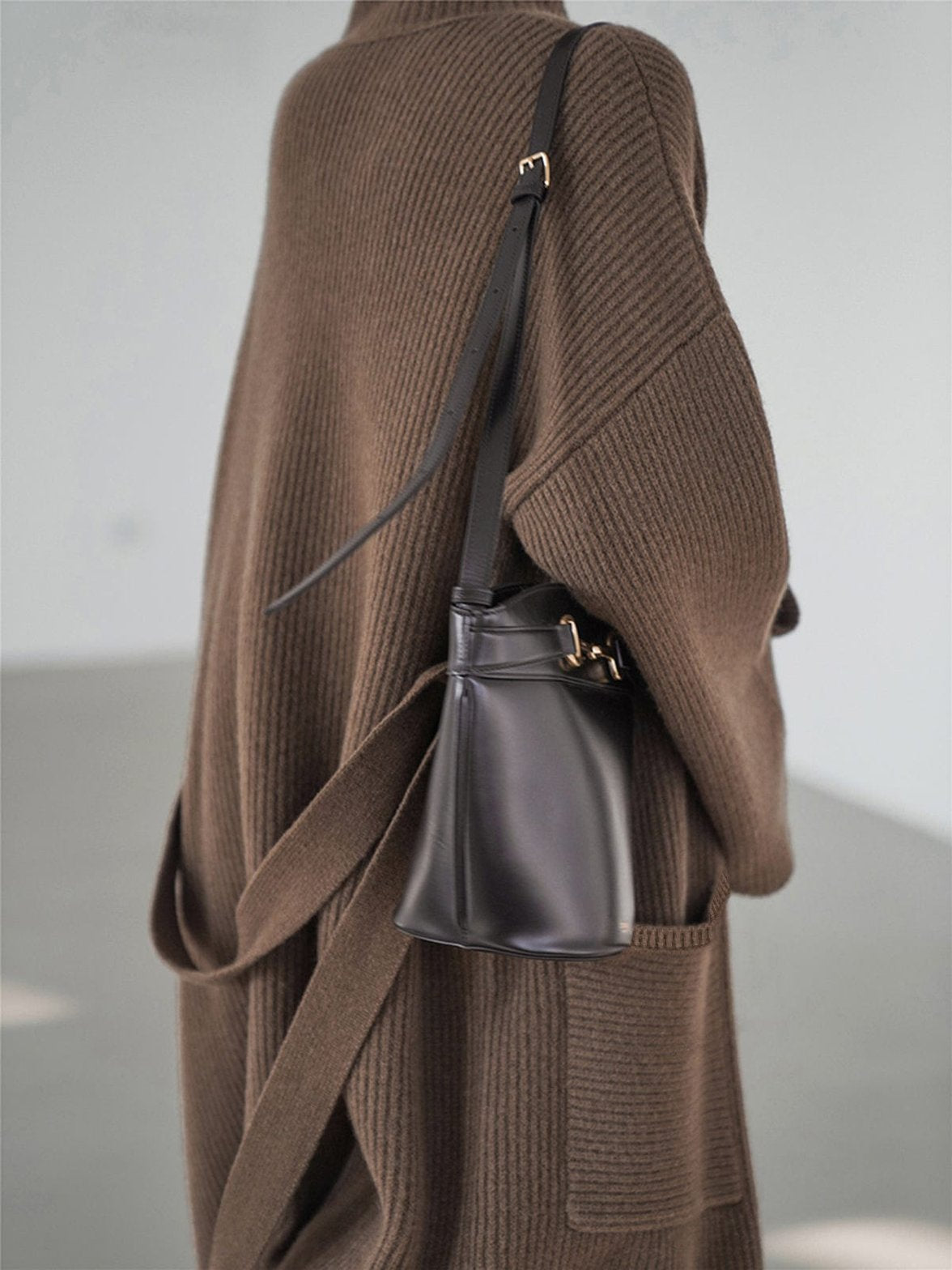 Détail maille tricotée trench long chaleur