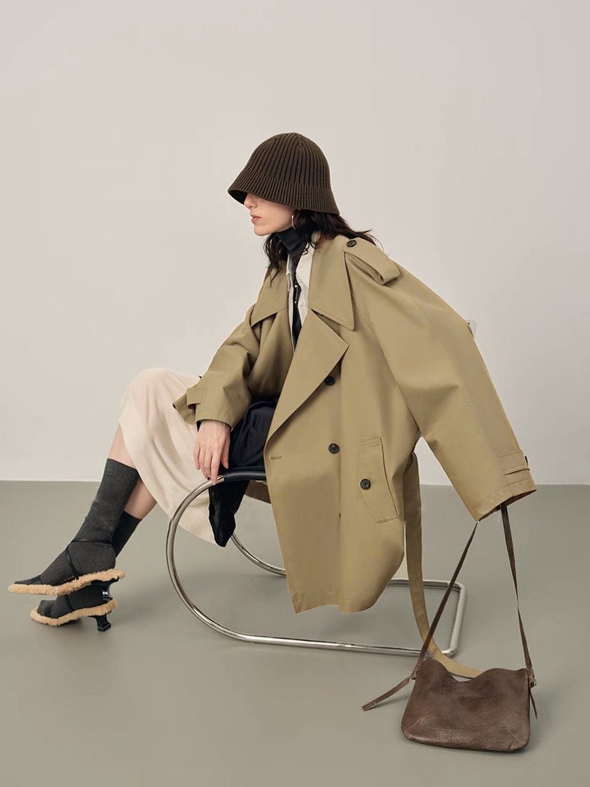 Trench beige détail manche léger