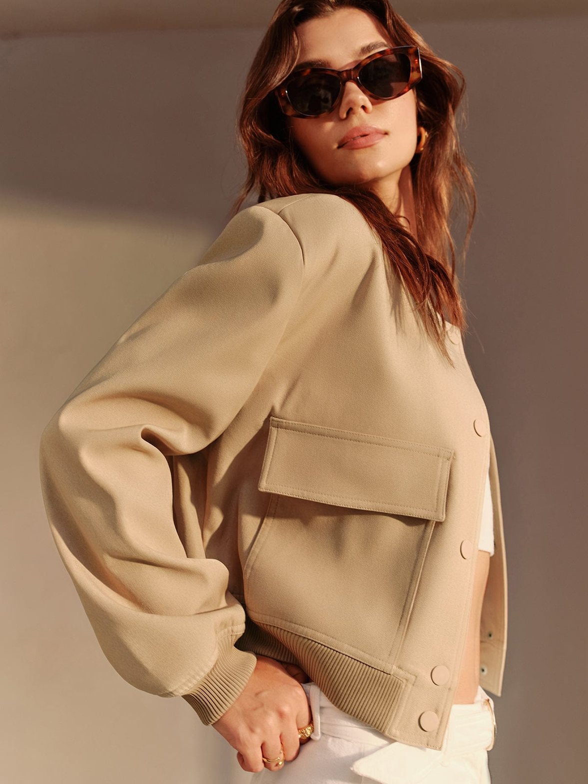 Veste bomber détail des boutons rosée