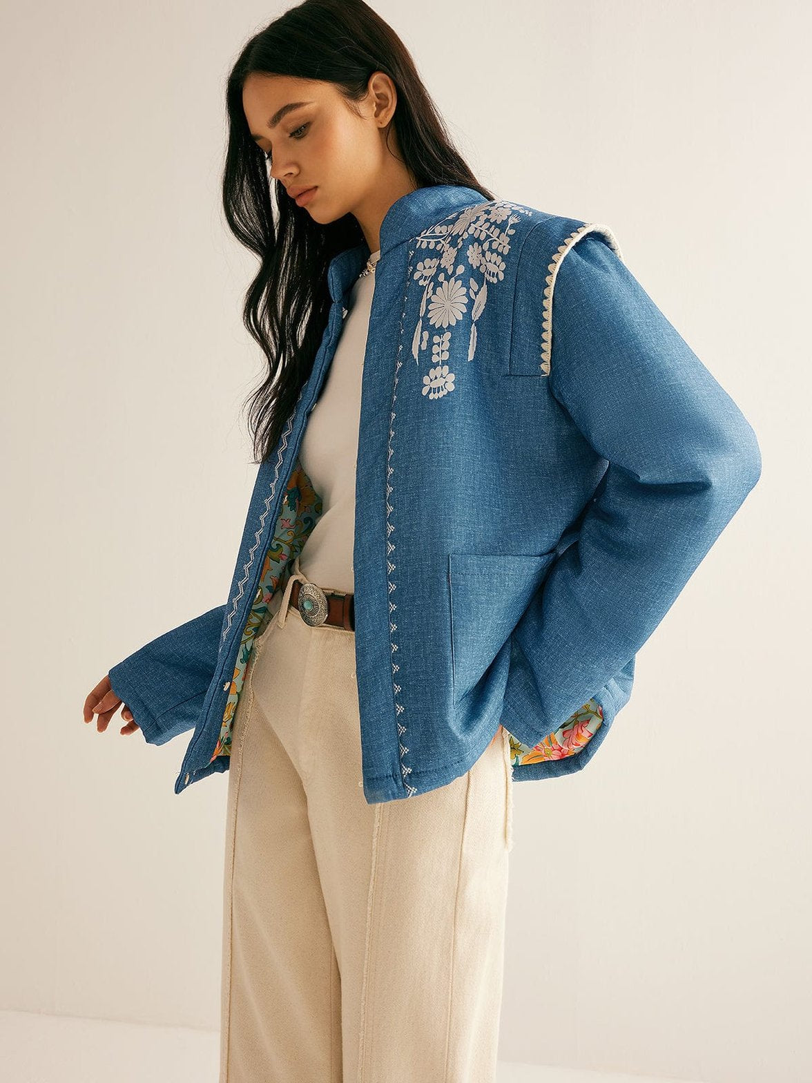 Veste hivernale bleue brodée soleil