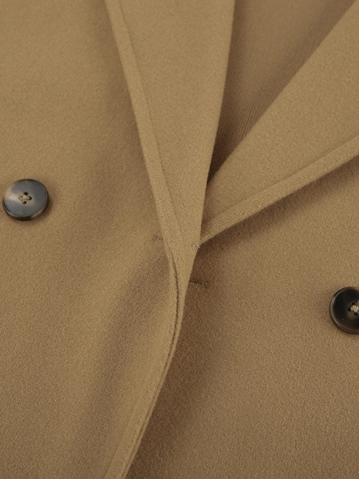 Veste ample beige vue de profil élégance