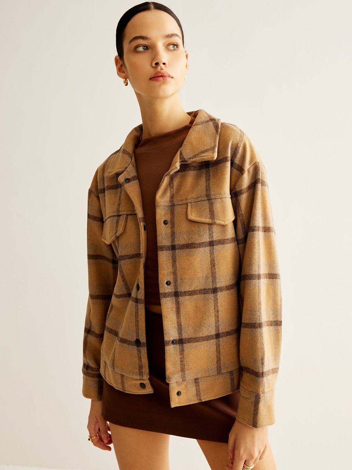 Veste à carreaux beige détail poche liberté