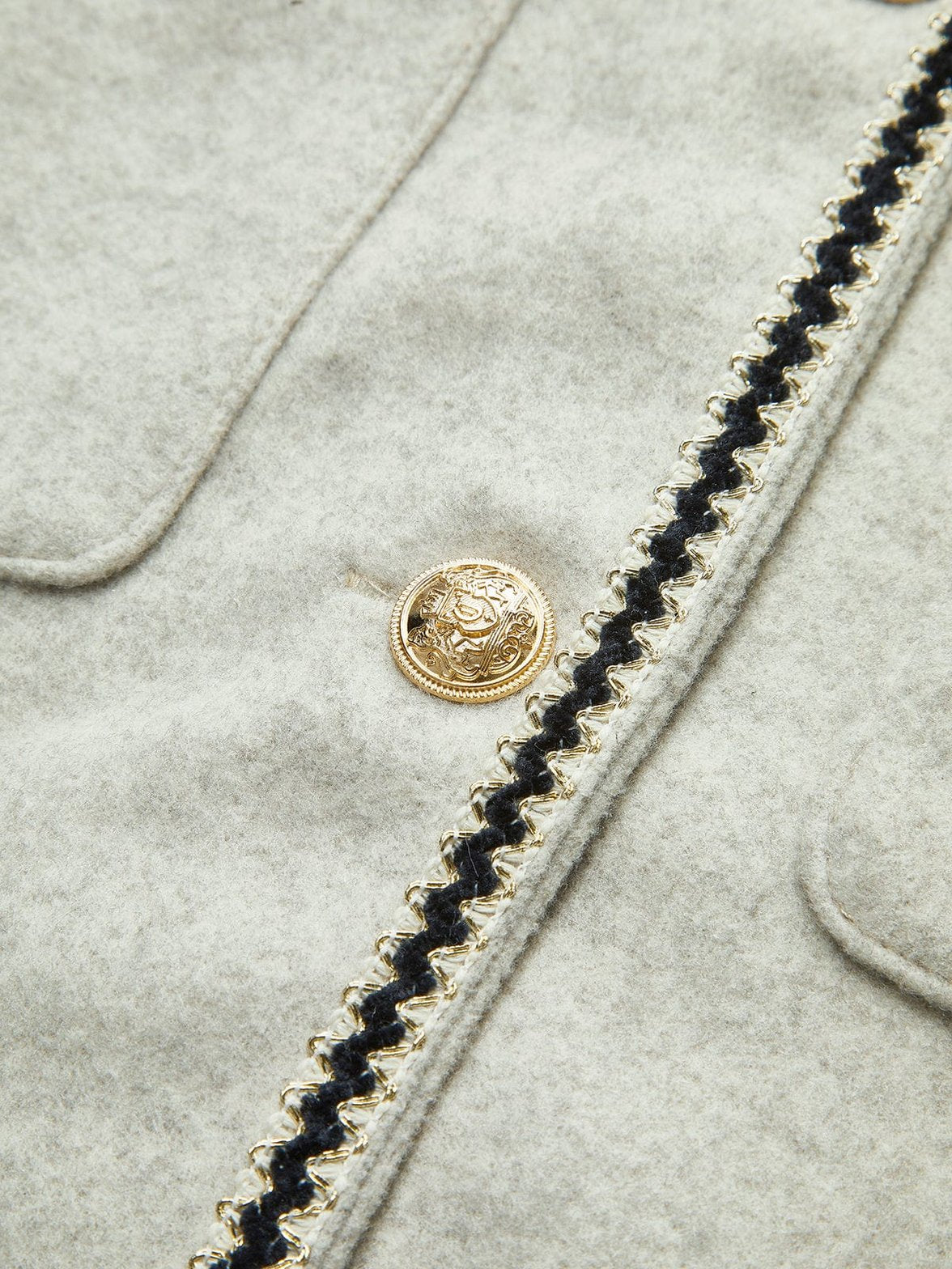 Veste élégante poches contrastées chic