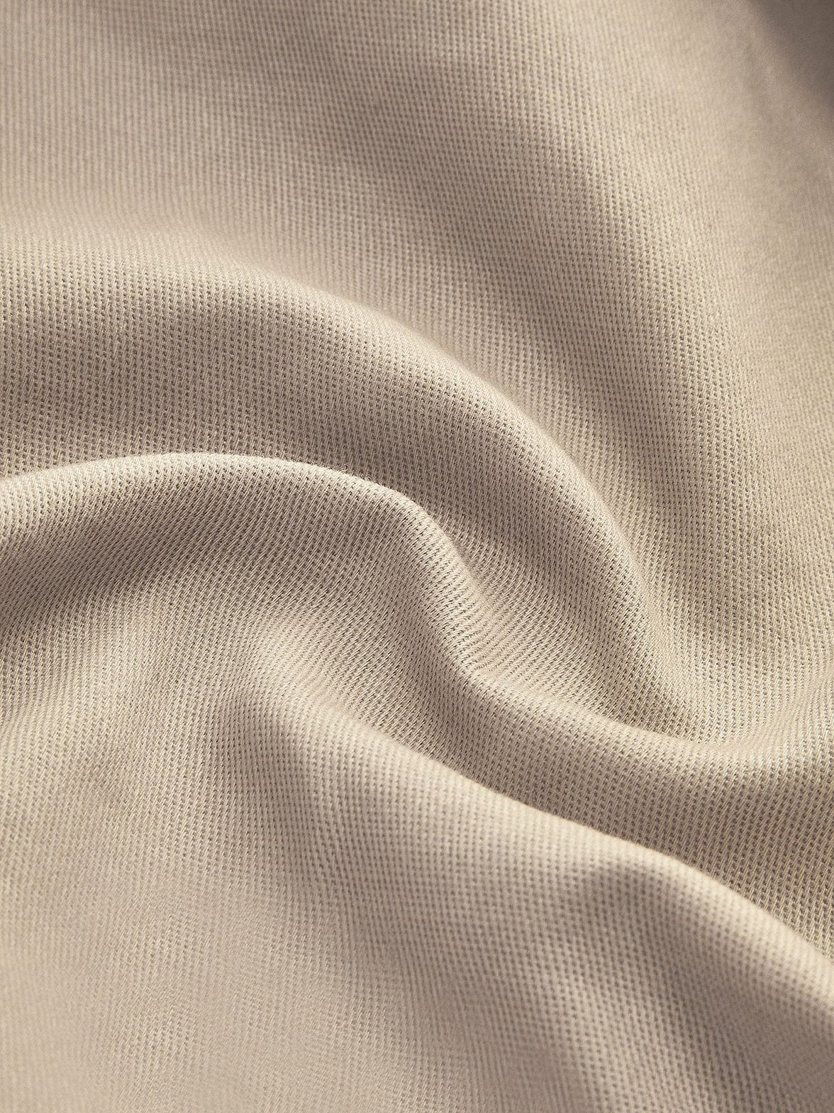 Veste beige vue de dos mélodie