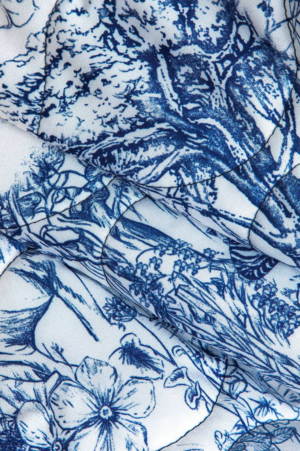 Détail motif floral veste légère fraîcheur