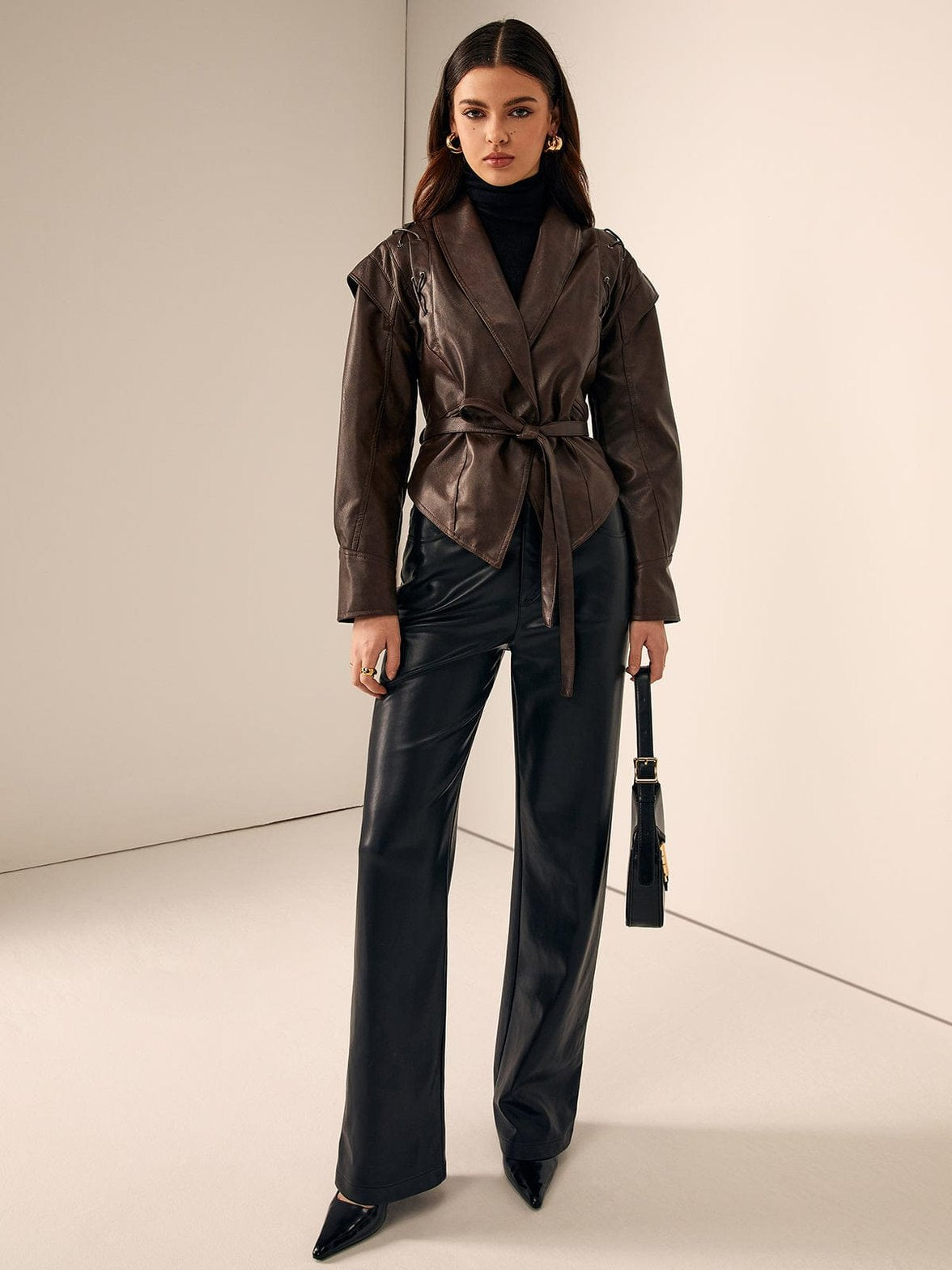 Veste similicuir marron détail dos cristal