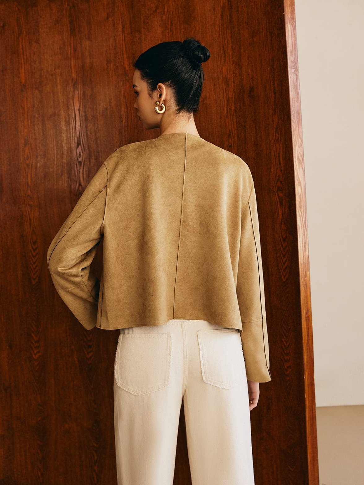 Détail manches veste daim confort