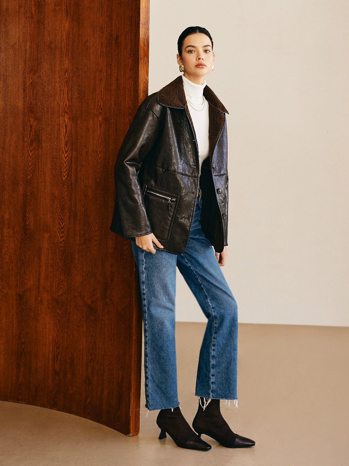 Veste en cuir doublée polaire détail dos élégance