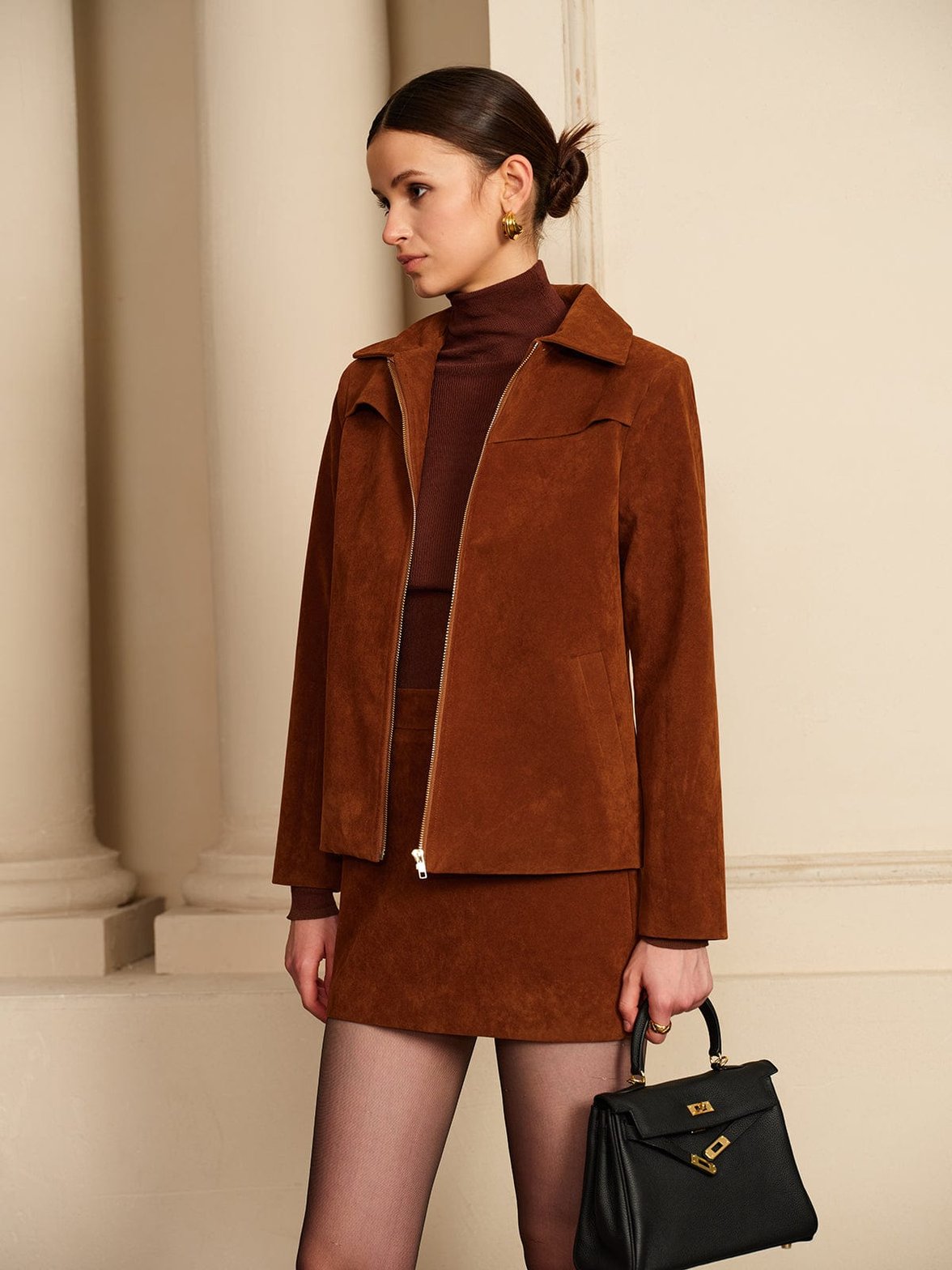 Détail fermeture veste daim magnifique