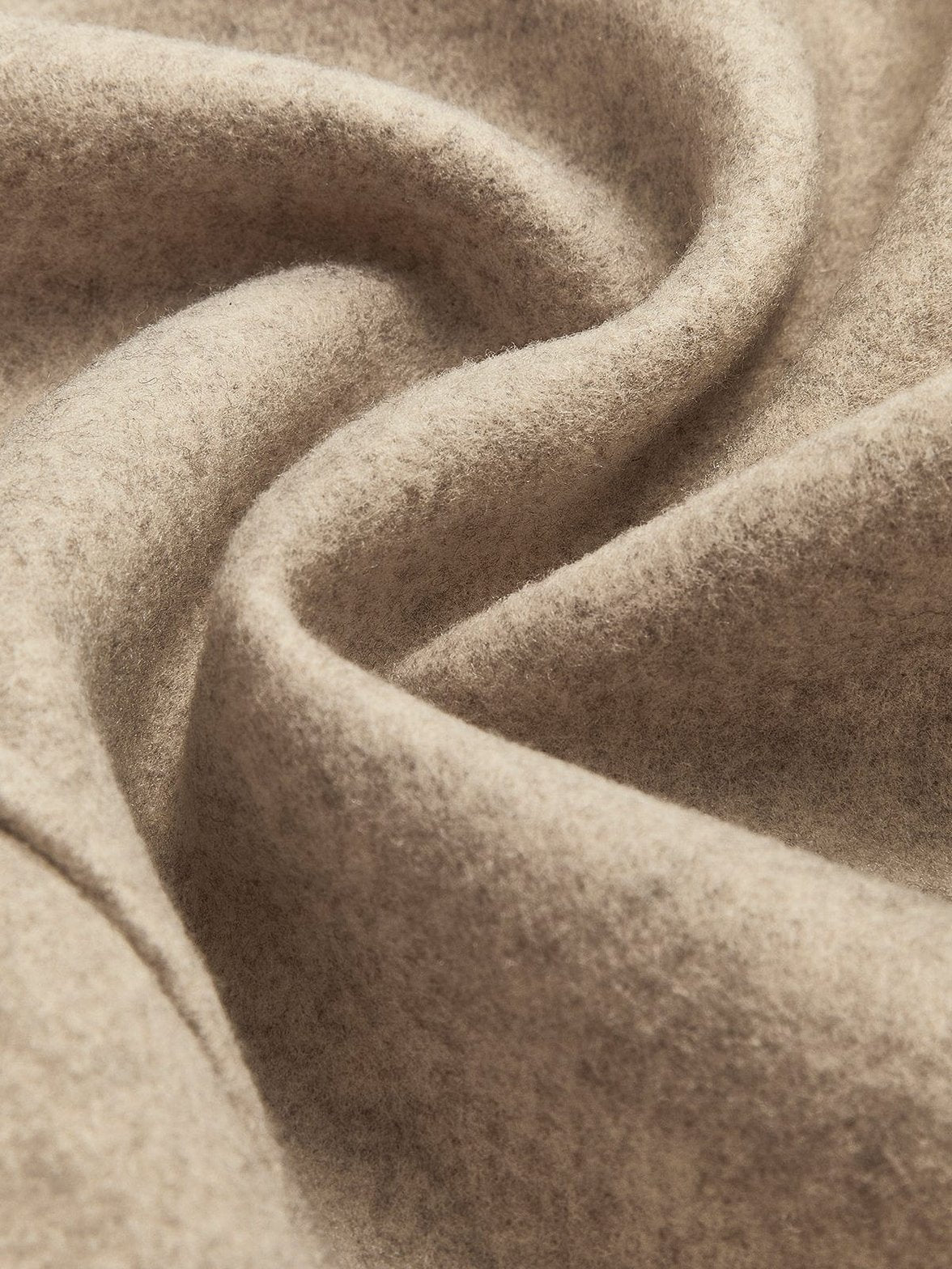 Veste tweed beige détail des finitions nuage