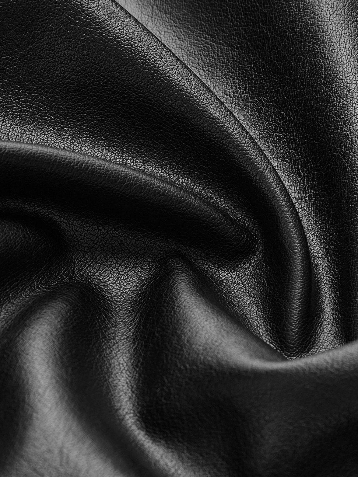 Veste simili-cuir détail ceinture raffinement