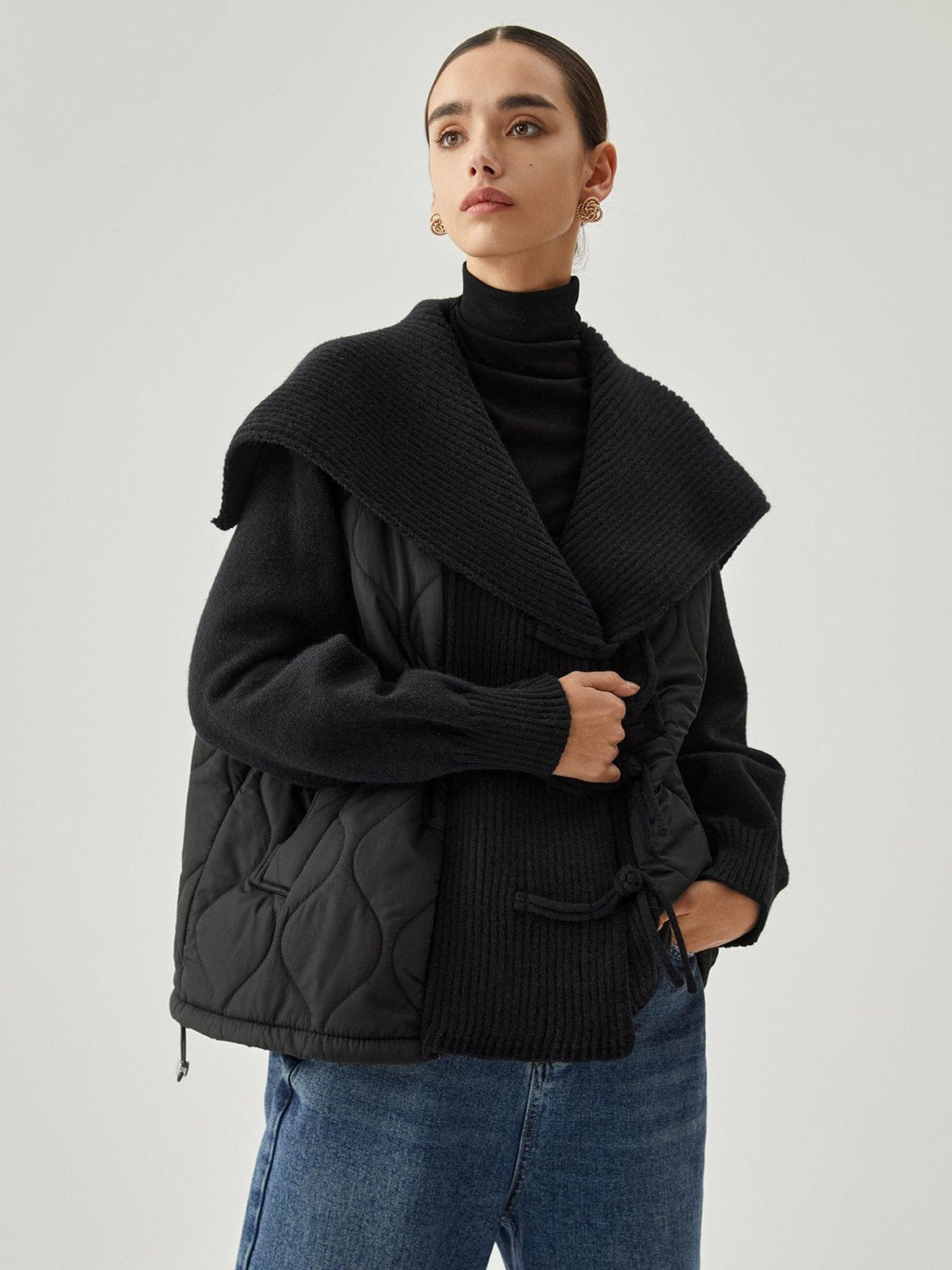 Veste noire matelassée vue profil style