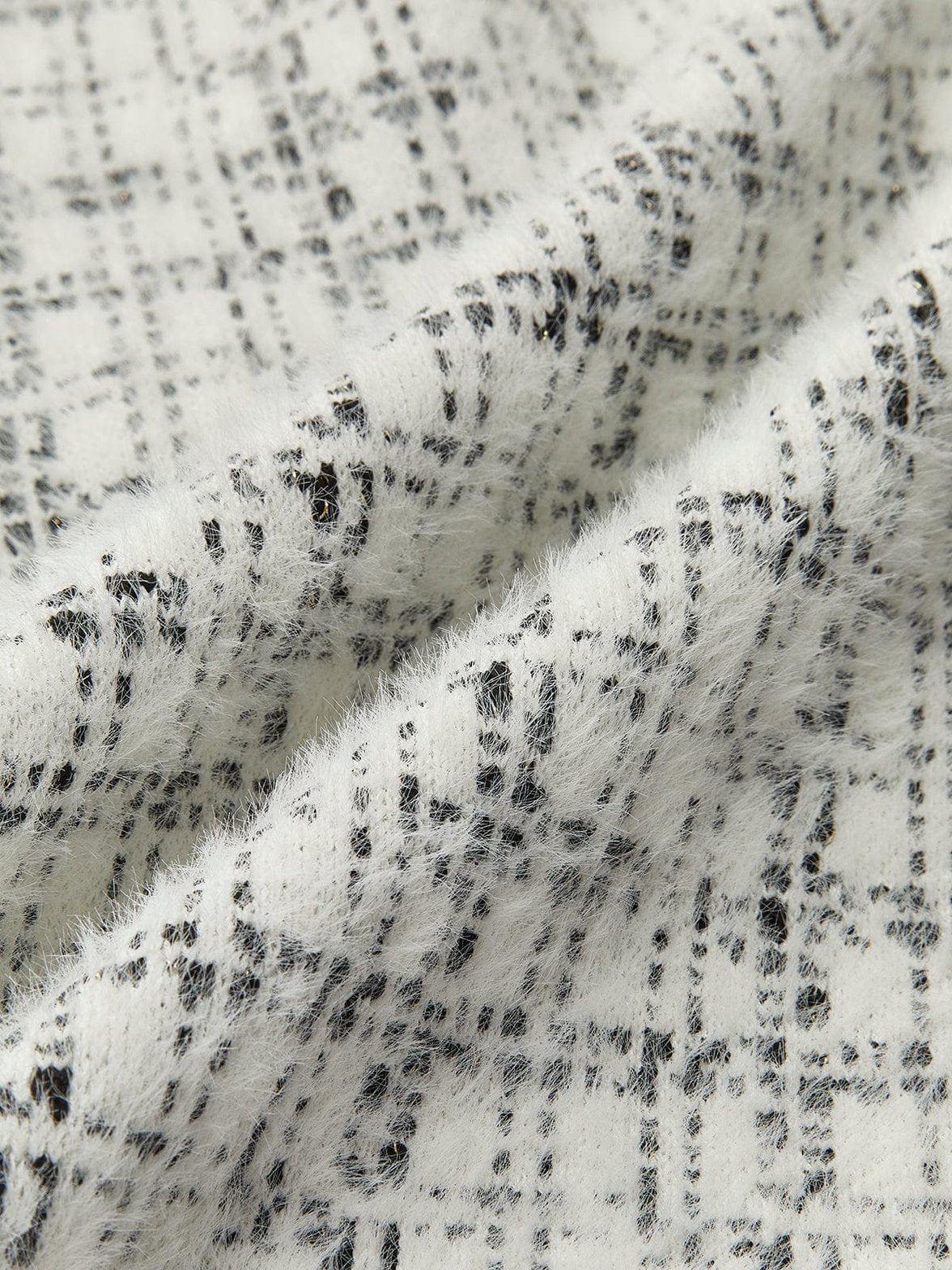 Veste tweed détail des finitions étoile