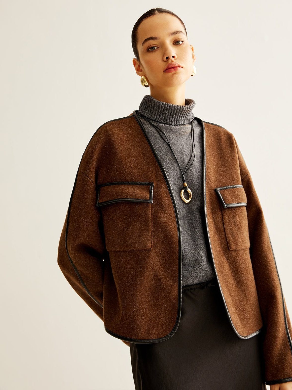 Veste tweed marron élégante vue de face soleil