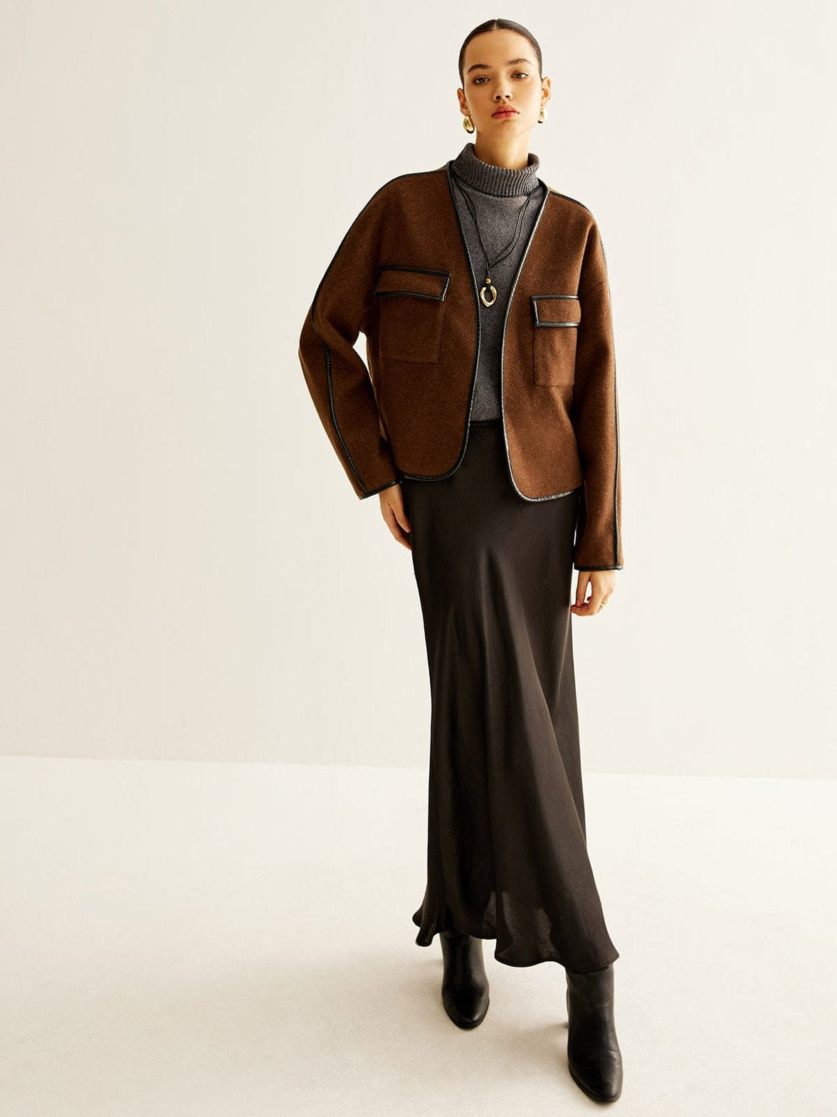 Veste tweed marron vue de côté océan