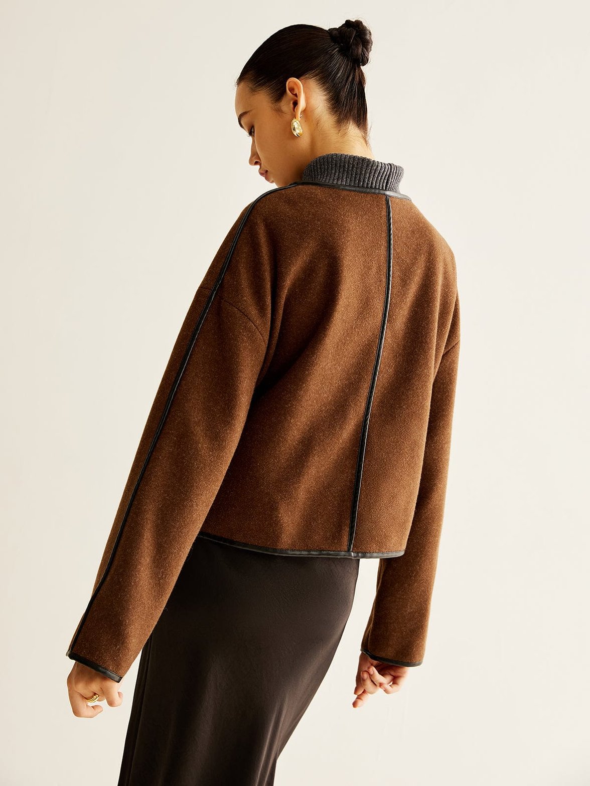 Veste tweed marron détail de la matière pluie
