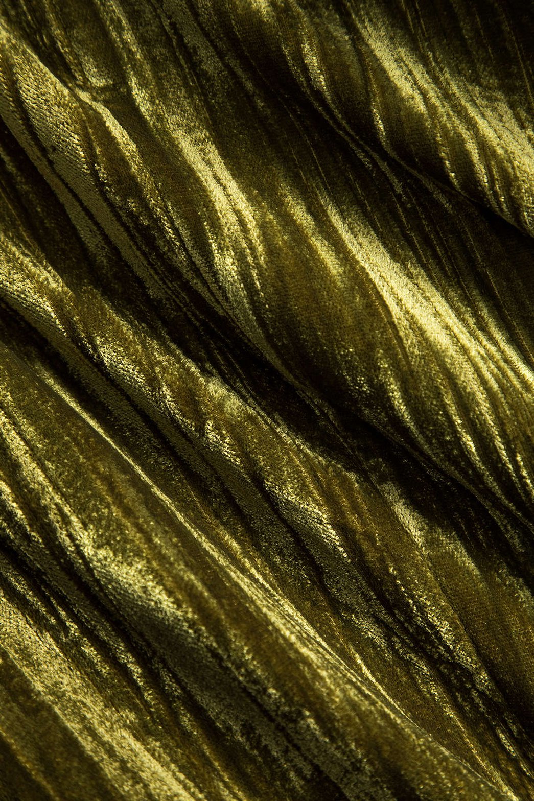 Veste velours vert ceinturée détail texture luxe