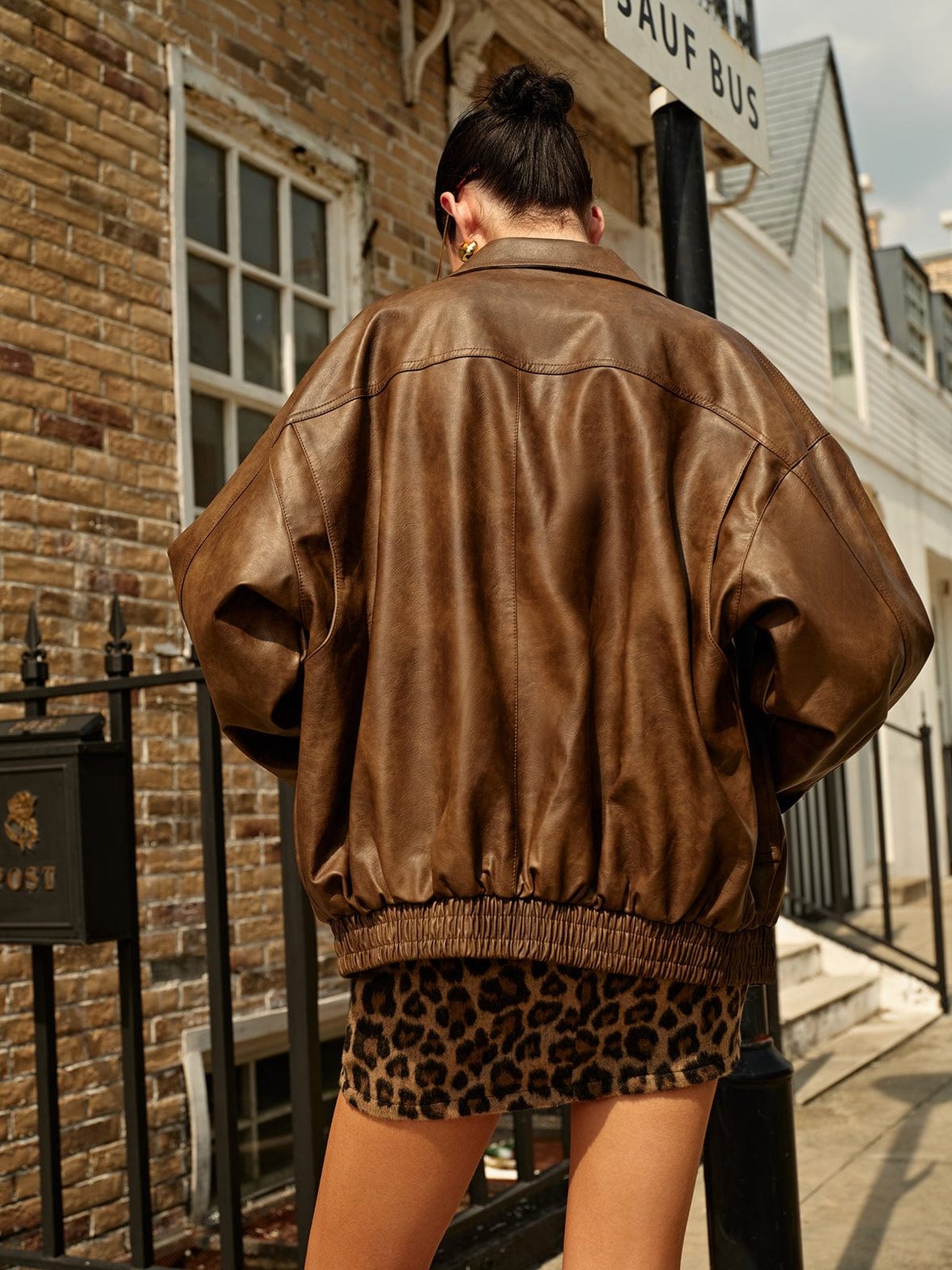 Veste marron en simili cuir détail des manches - confort