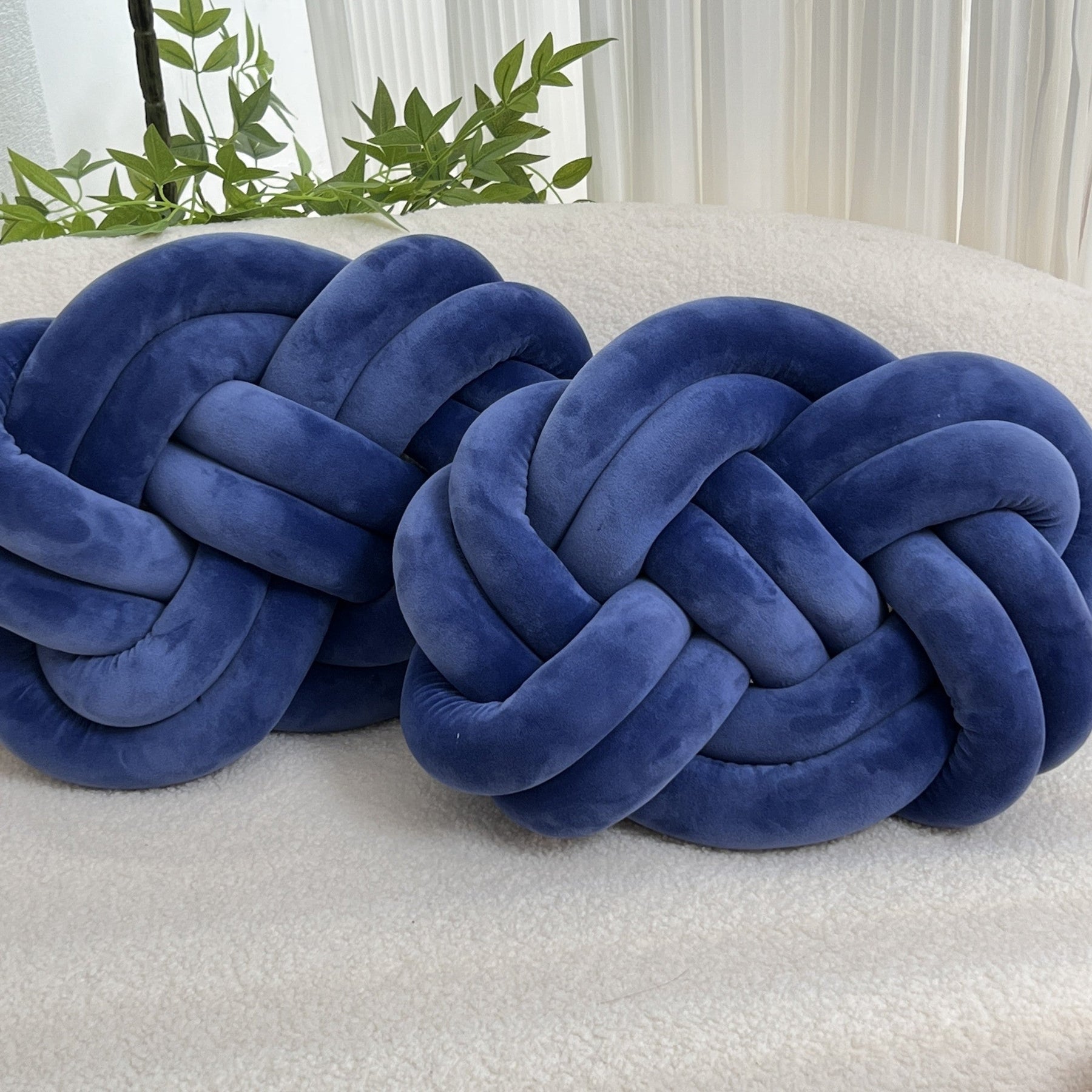 Coussins en Peluche en Forme de Nœud - Doux et Élégants pour Votre Intérieur