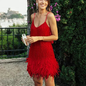 Robe à Paillettes et Plumes - Élégance et Glamour pour Soirées Spéciales