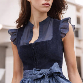 Robe dirndl bleu marine élégante - Tablier assorti et coupe féminine