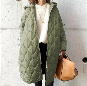 Manteau Long Matelassé à Capuche - Élégance Légère et Confort Optimal