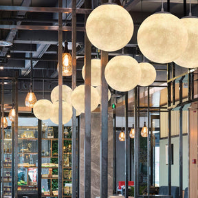Suspension Lumineuse Design Épuré - Éclairage Ambiant Réglable et Élégant