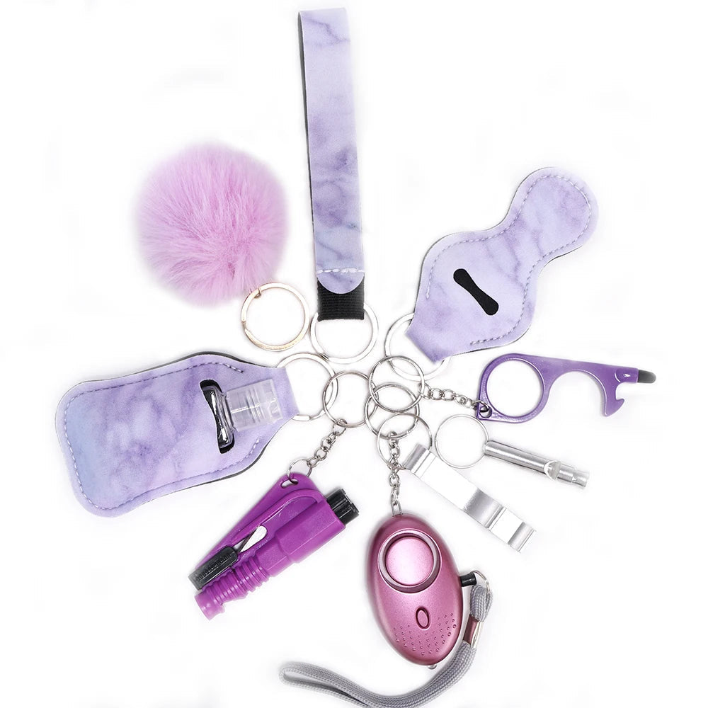 Porte-clés d'autodéfense pour Femmes - Alarme, Brise-vitre et Lumière LED