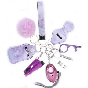 Porte-clés d'autodéfense pour Femmes - Alarme, Brise-vitre et Lumière LED