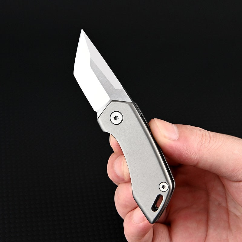 Couteau de Poche en Titane - Compact et Pratique pour Voyager