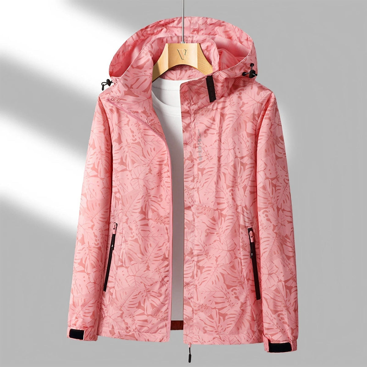 Veste Imperméable Légère pour Femmes - Capuche Ajustable et Poches Zippées