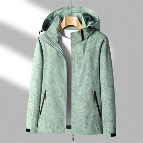 Veste Imperméable Légère pour Femmes - Capuche Ajustable et Poches Zippées